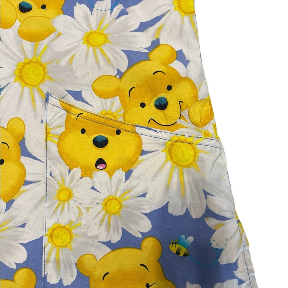 Disney Blue and Yellow Floral Print Adult Woman’s Scrub.
Size S - Picture 4 of 13